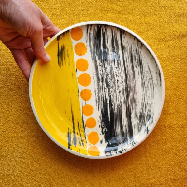 Plat creux céramique graphique, jaune noire et orange,motif abstrait coloré. Fabrication artisanale