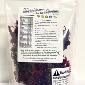 May include: A clear plastic pouch containing dried dark purple Irish sea moss. The front label features the text M&S Windward Trading, instructions on how to make gel, a nutritional table, and a warning label regarding risk of suffocation.