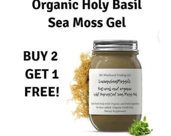 May include: A glass jar filled with a green sea moss gel. The jar has a silver lid and a white label with the text "Luciansen Mossto. Natural and organic Wild Harvested Sea Moss Gel". The label also includes the text "MG Windward Trading LLC" and "Rade fresh Daily with Organic and Fresh Ingredients. No Heat added. Organic Fresh Fruit. Dietary Supplement".
