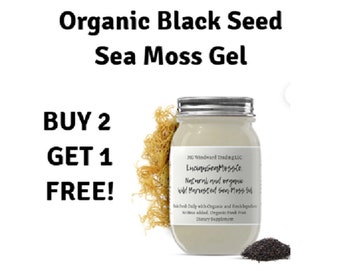 May include: A glass jar filled with a light beige gel, labelled "Luciansen Messto. Natural and organic Wild Harvested Sea Moss Gel". The jar is sitting on a white surface with a small pile of black seeds and a clump of dried sea moss.