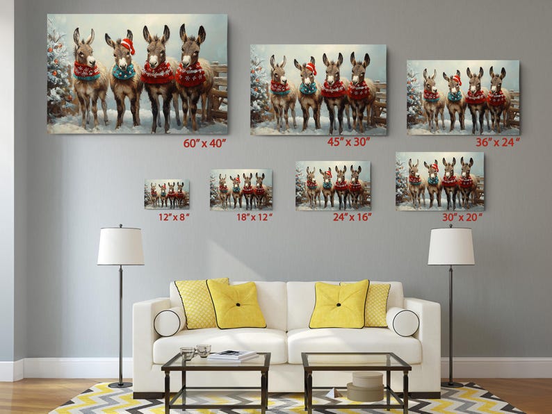a living room filled with furniture and pictures on the wall
