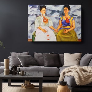a painting of two women sitting on a couch