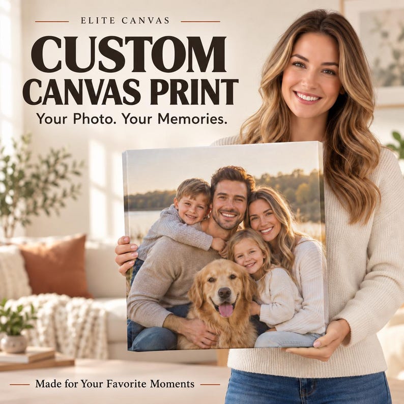 A woman is holding a large canvas print of a family portrait, smiling and posing for the camera.