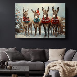 a painting of three donkeys wearing christmas sweaters