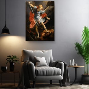 a living room with a chair and a painting on the wall