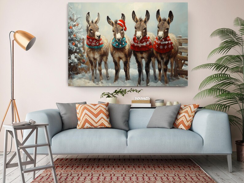 a painting of three donkeys wearing christmas sweaters