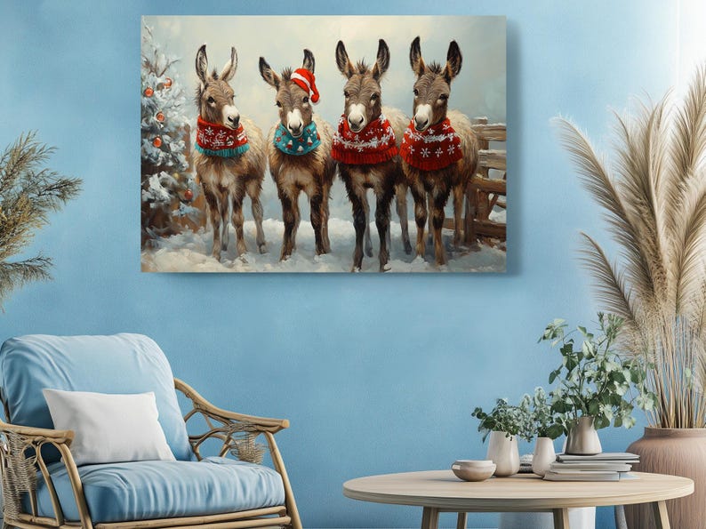 a painting of three donkeys wearing christmas sweaters