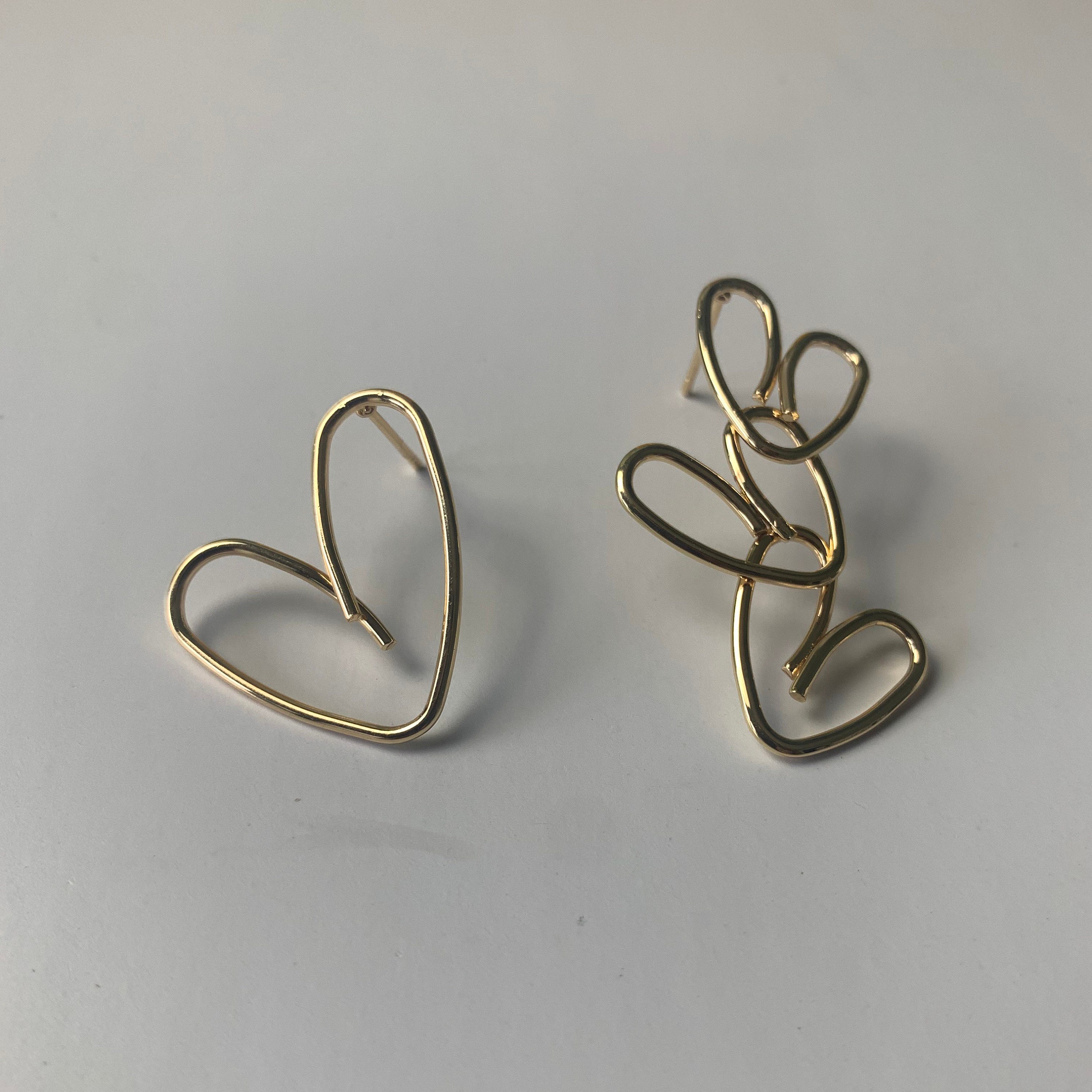 ASYMMETRICAL HEART EARRINGS Abstract 