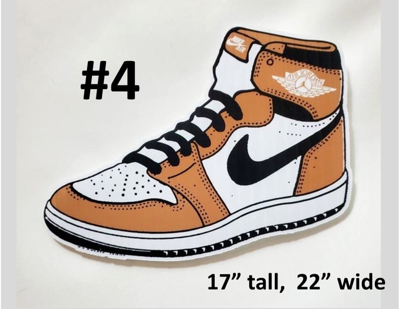 May include: A brown and white sneaker with a black swoosh and the text "Air Jordan" on the side. The sneaker is 17 inches tall and 22 inches wide.