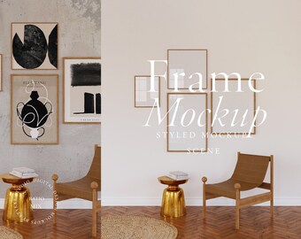 May include: A styled mockup scene featuring four empty picture frames with wooden frames hanging on a white wall. The frames are arranged in a staggered pattern. The scene includes two wooden chairs and a gold side table with books on top. The text "Frame Mockup" is written in white on the wall.