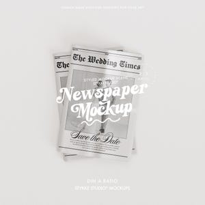 May include: A mockup of two newspapers titled "The Wedding Times" with the text "Newspaper Mockup" and "Save the Date" in a stylized font. The newspapers are on a white background, ideal for showcasing wedding-related designs.