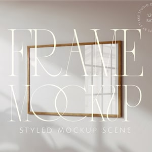 May include: A styled mockup scene featuring a wooden frame with a white background. The frame is hanging on a white wall with a shadow cast from a window. The text "FRAME MOCKUP" is written in white letters below the frame. The text "STYLED MOCKUP SCENE" is written in white letters below the text "FRAME MOCKUP".