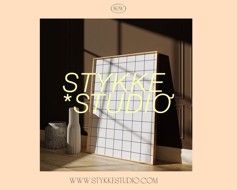 May include: A white and black grid pattern on a framed canvas with a gold frame. The canvas is leaning against a brown wall with a light source shining on it. The text "STYKKE STUDIO" is in yellow letters on the wall. The text "WWW.STYKKE STUDIO.COM" is at the bottom of the image.