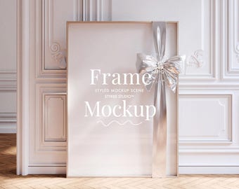 Bow frame mockup DIN A, metallic silver ribbon poster mockup design, vertical tall art mockup in bright Scandinavian gallery room POD mockup