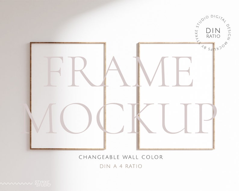 May include: Two rectangular wooden picture frames with white interiors are displayed against a white wall. The word "FRAME MOCKUP" is overlaid in a light purple font. The text "CHANGEABLE WALL COLOR" and "DIN A 4 RATIO" are also visible.