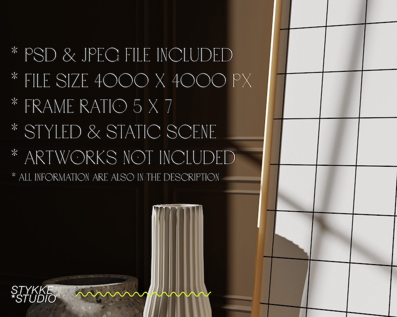 May include: A white ceramic vase with a ribbed texture sits on a table in front of a large, framed grid. The frame is made of wood and has a light brown finish. The background is a dark brown wall with a light brown trim.