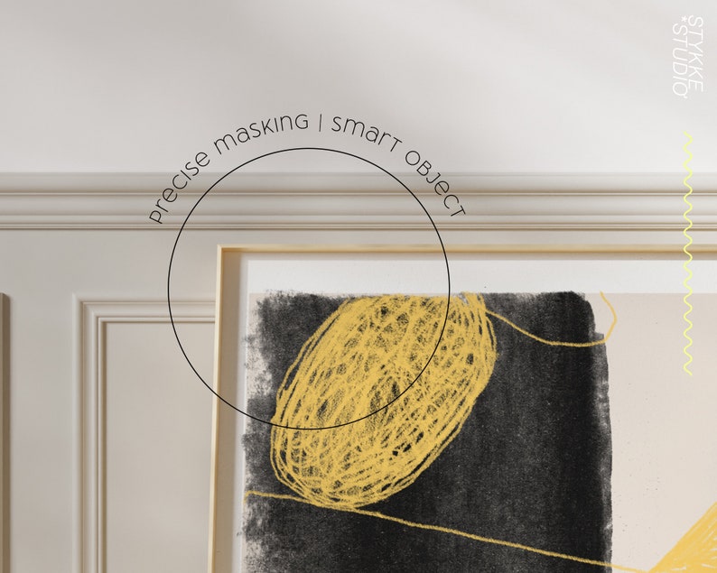 May include: A framed abstract art print with a black background and a yellow, scribbled circle in the center. The text "precise masking | smart object" is written in a circle above the print.