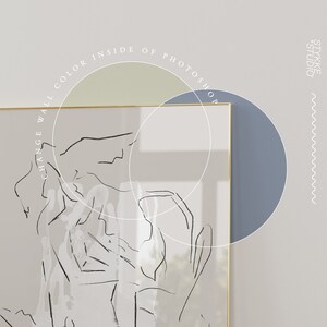 May include: A framed black and white line art print of a person's body with a light green and blue circle overlay. The frame is gold and the background is white.