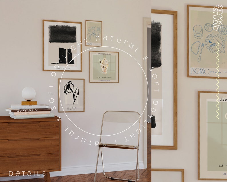 May include: A collection of framed art prints with minimalist designs, including a black and white floral print, a print with a vase of flowers, and a print with a black and white abstract design. The prints are hung on a white wall with a wooden dresser and a clear plastic chair in the foreground.