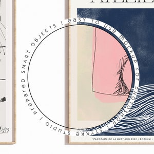 May include: Two framed art prints. One features black and white abstract shapes and lines. The other has a pink and beige shape on a navy blue background with white wave-like lines. Text includes "easy to use mockup for photoshop".
