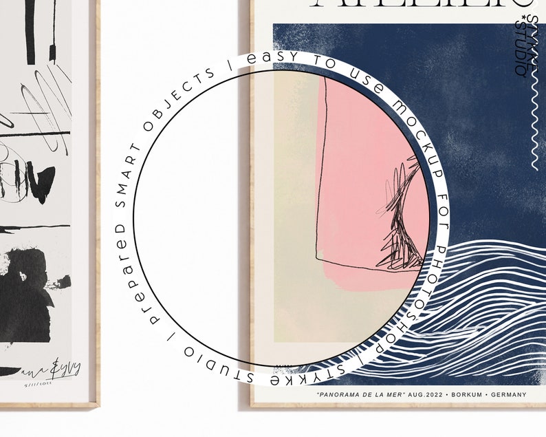 May include: Two framed art prints. One features black and white abstract shapes and lines. The other has a pink and beige shape on a navy blue background with white wave-like lines. Text includes "easy to use mockup for photoshop".