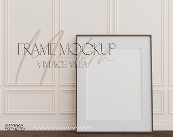 dark frame mockup in vintage room with classic creme white walls, frame mockup for digital art, 8x11 ratio mockup, interior frame mockup