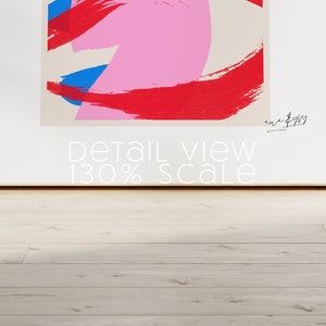 May include: Abstract art print with pink, red, and blue brushstrokes on a beige background. The print is titled "en & gy" and "studio" in the top right corner. The text "Detail view 130% scale" is at the bottom of the print.