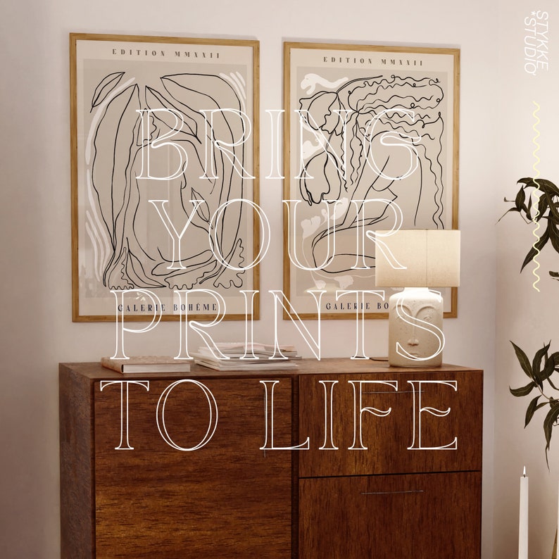 May include: Two framed black and white line art prints with the text "EDITION MMXVII" and "GALERIE BOHEME" on a wooden dresser with a white ceramic lamp. The text "BRING YOUR PRINTS TO LIFE" is superimposed on the image.