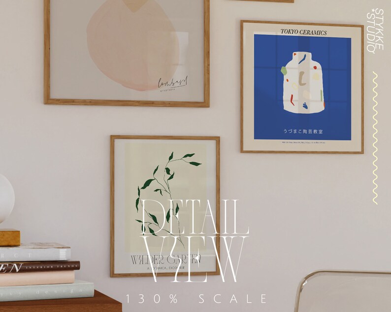 May include: Three framed art prints with a white background. The print on the left features a pink watercolor design with the word "Conserved" written in black. The print in the center features a green leafy branch. The print on the right features a blue background with a white ceramic vase with colorful geometric shapes. The text "TOKYO CERAMICS" is at the top of the print. The text "うづまこ陶芸教室" is at the bottom of the print. The text "*STUDIO" and "STYKKE" are written vertically on the right side of the image.