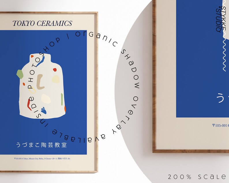 May include: Two framed art prints. The left print features a white vase with colorful abstract shapes on a blue background. Text reads "TOKYO CERAMICS" and Japanese characters. The right print has a blue background with text and Japanese characters.