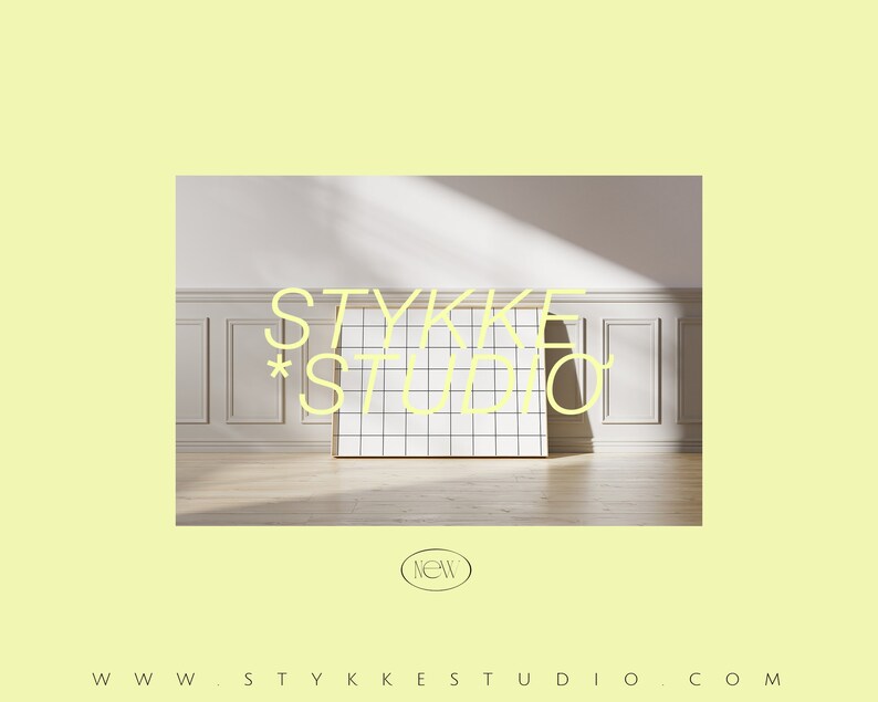 May include: A white room with wood paneling and a white gridded board with the text "STYKKE STUDIO" in yellow. The text "NEW" is in a circle below the board.