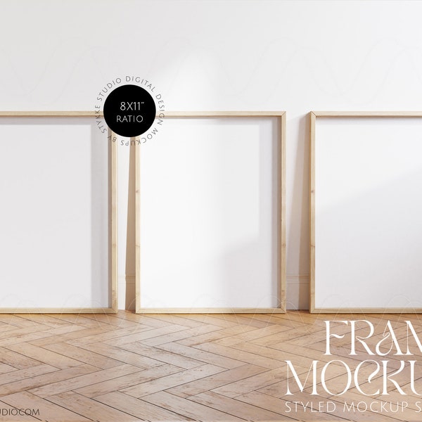 three frames mockup 8x11 ratio, wooden frames mockup on wooden floor in bright room, set of 3 digital vertical frames mock up