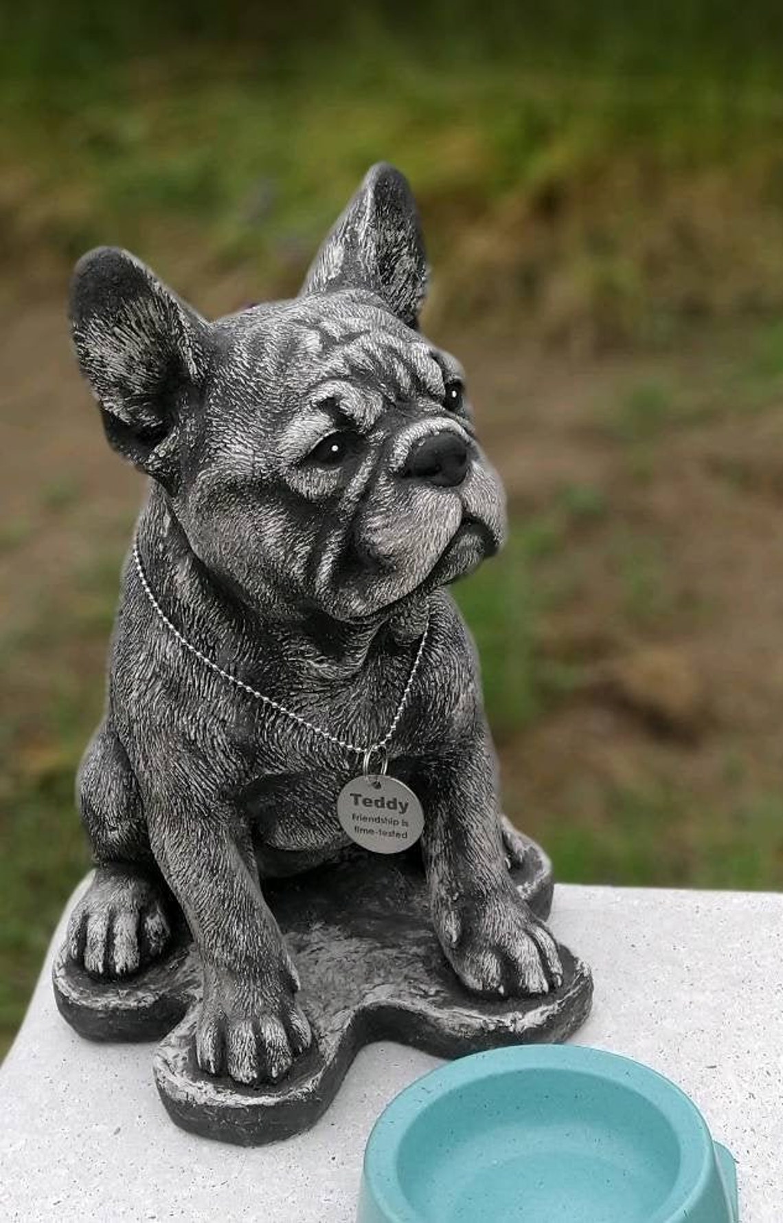 large silver bulldog statue