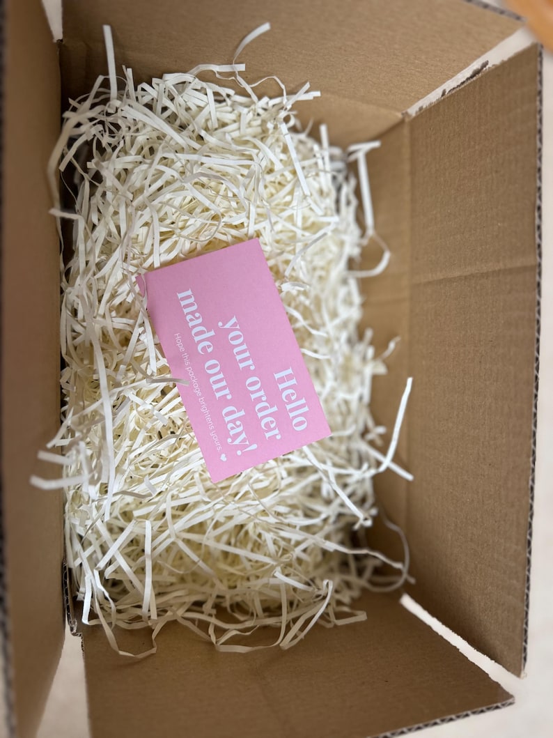 Gift-ready personalised glass mug carefully packaged in eco-friendly shredded paper with thank you card, ideal for gifting to a new mum.