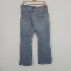 Vintage Levi&#39;s Distressed Denim Jeans