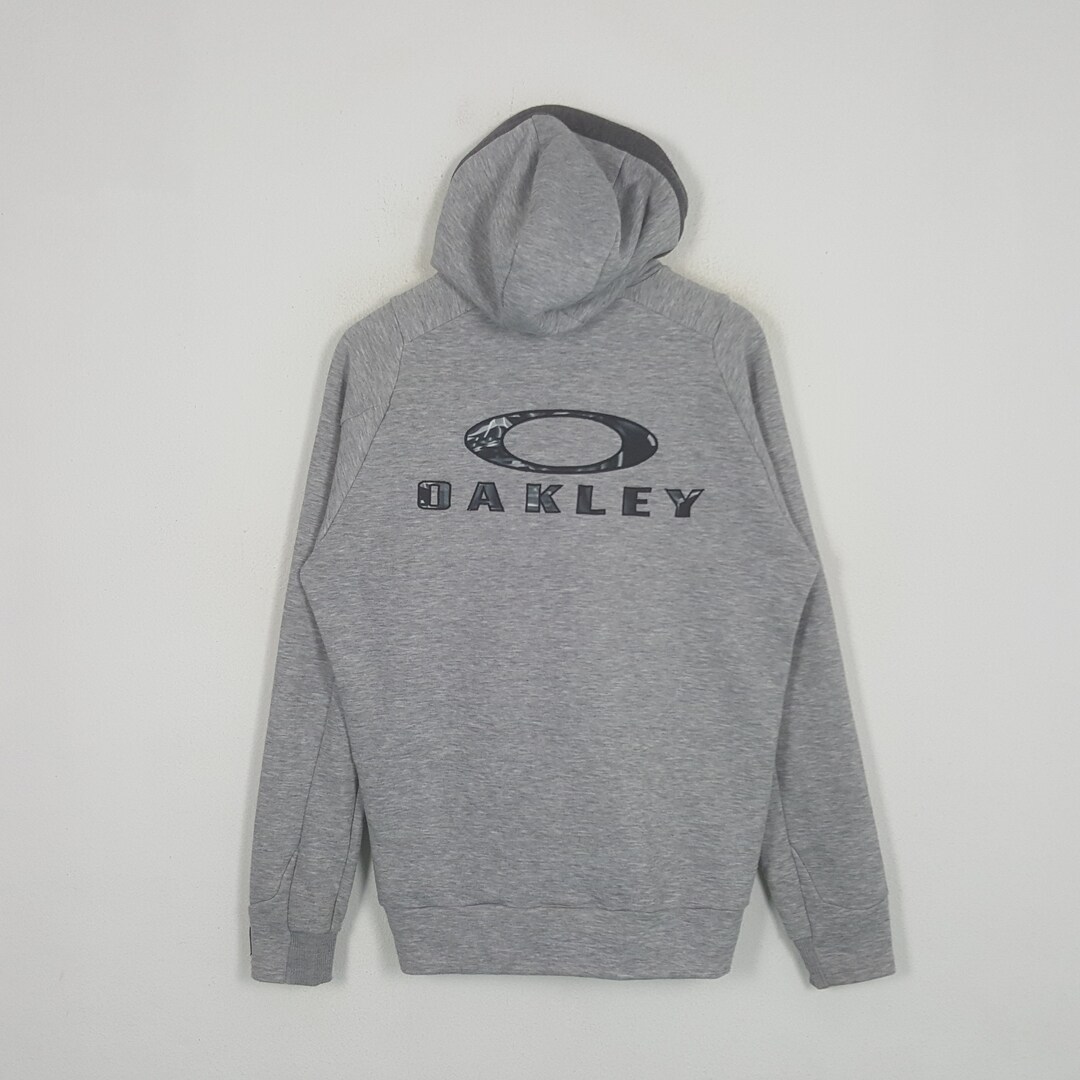 トップス 00s OAKLEY Logo Hoodie Oakley Men's Space Camo Logo Hoodie - Worldwide Golf Shops