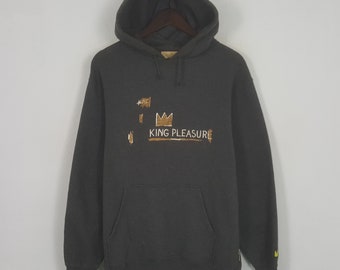 Sudadera con capucha de Michel Basquiat y vaqueros vintage