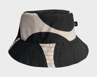 Pluvo Bucket Hat Fashion Stones. Clothing Print. Gifts for Women. Gifts for Men. Unisex Bicycle Jacket Poncho