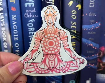 May include: A sticker of a person in a yoga pose with a mandala design. The sticker says "Namaste" on the bottom.