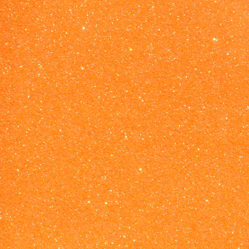 Puede incluir: Primer plano de un fondo de purpurina naranja brillante.
