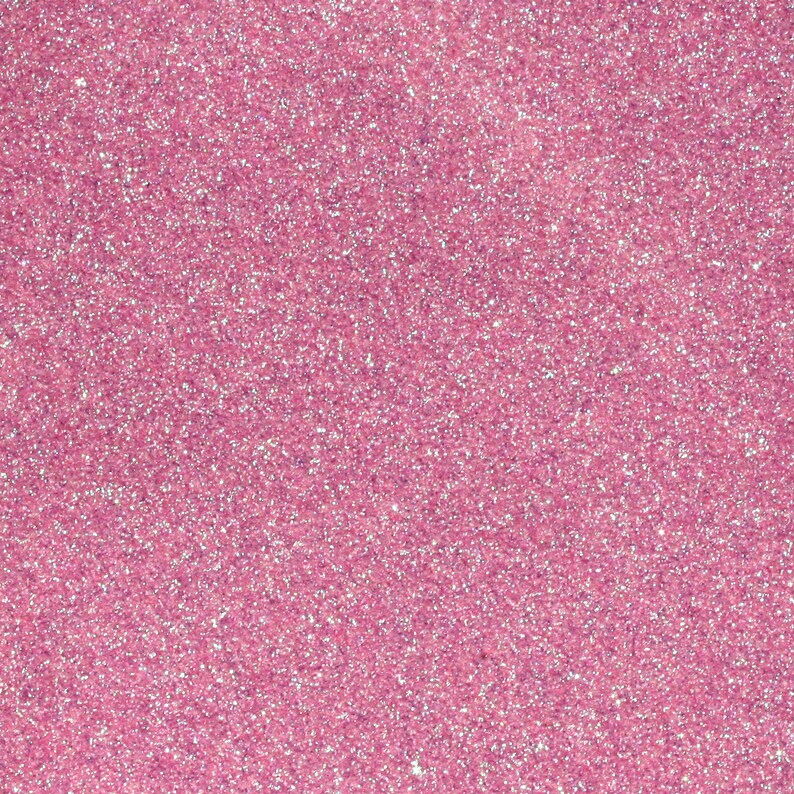 Puede incluir: Primer plano de un fondo de purpurina rosa. La purpurina es muy fina y crea un efecto brillante.