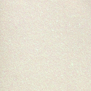 Puede incluir: Primer plano de una superficie blanca, brillante y texturizada.