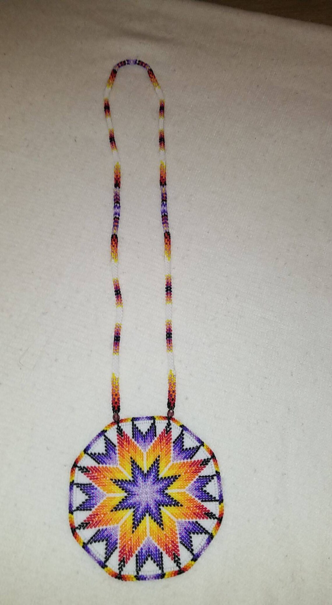 Quilled medallions native made. Etsy