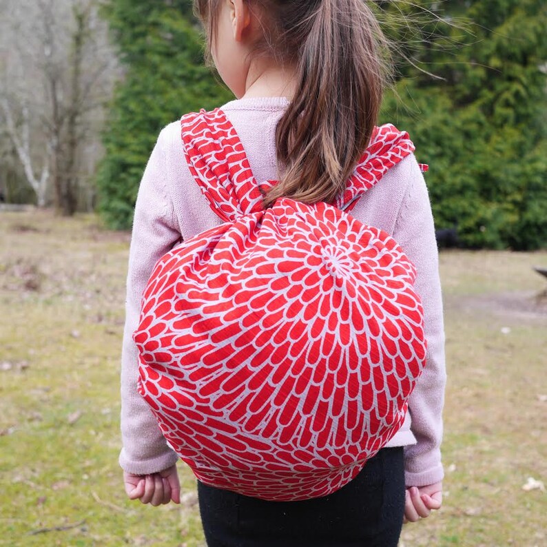 Large Furoshiki backpack. This reversible Furoshiki is very versatile and can be used as gift wrap, handbag, play mat and cushion cover. Blue and Red Chrysanthemum pattern.