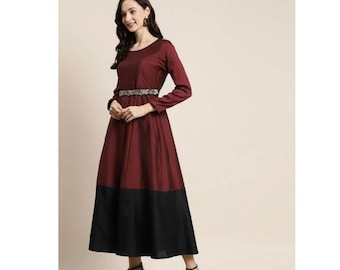 May include: A maroon and black midi dress with long sleeves and a fitted waist. The dress has a decorative belt with silver embellishments.
