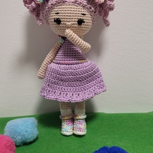 Crocheted little doll