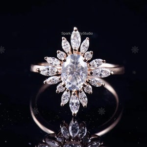 Oval Moissanit Halo Ring: Sterlingsilver med stjärnformad löparring