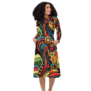 dress with long sleeves underneath How to Wear Shirts Under Dresses, According to a Fashion Editor