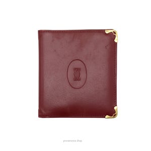 Cartera plegable Cartier de piel de becerro color burdeos