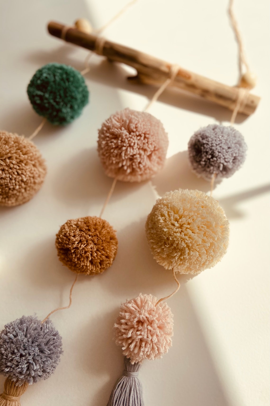 Pom pom garland Nursery wall art Yarn pom pom bunting baby Etsy